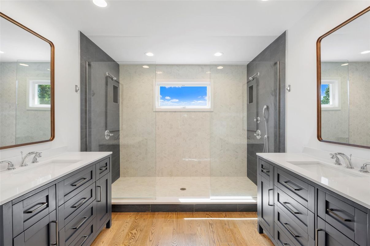 Bathroom, Dual Sink Vanities, Glass Shower, Interior, Recessed Lighting, Wood Texture Flooring