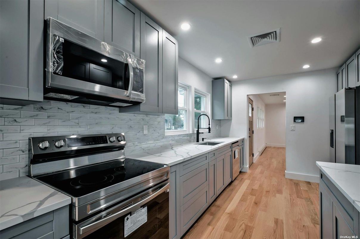 Interior, Kitchen, Recessed Lighting, Stainless Steel Appliances, Wood Texture Flooring