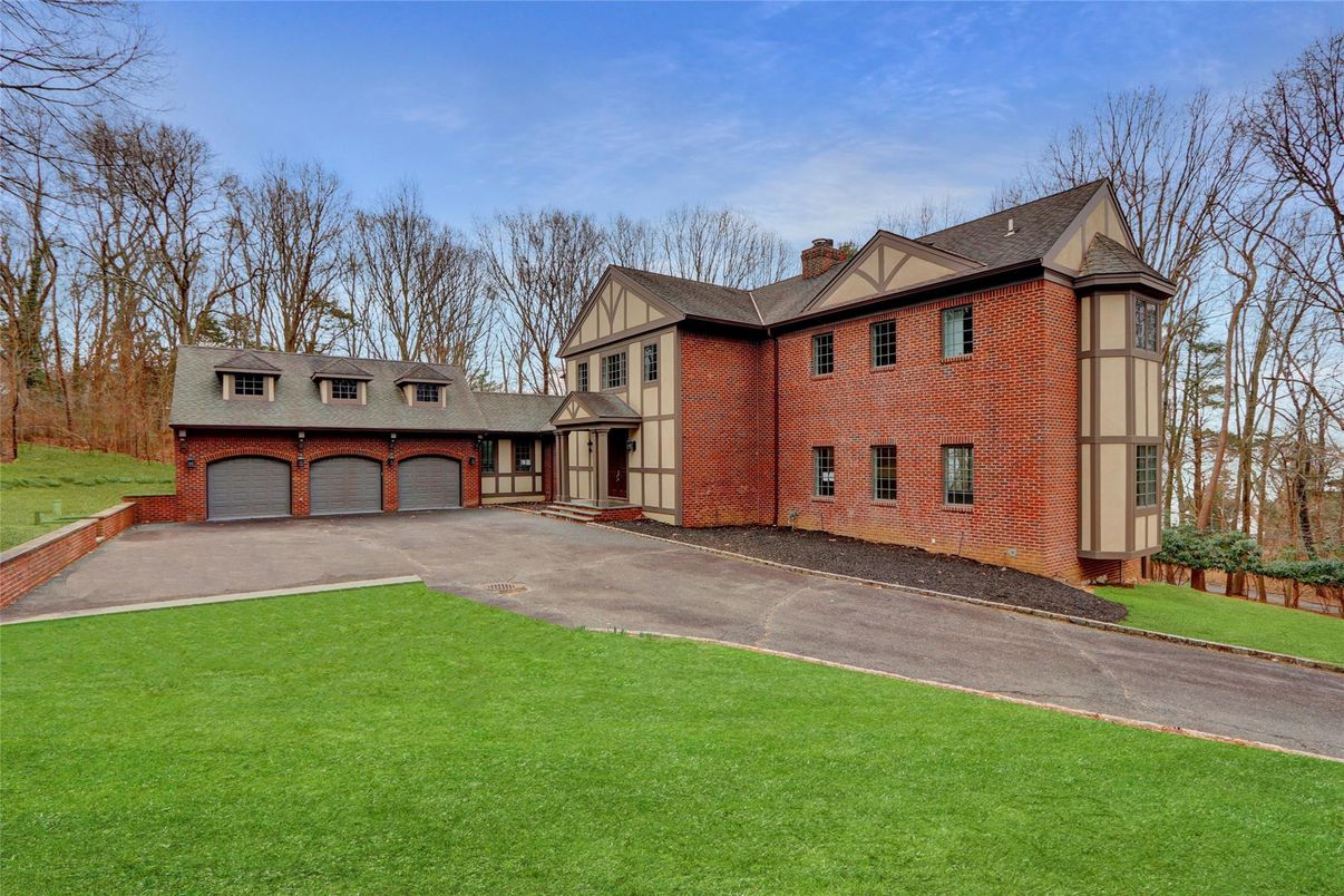 Attached, Backyard, Exterior, Facade, Brick Facade, Tudor Revival