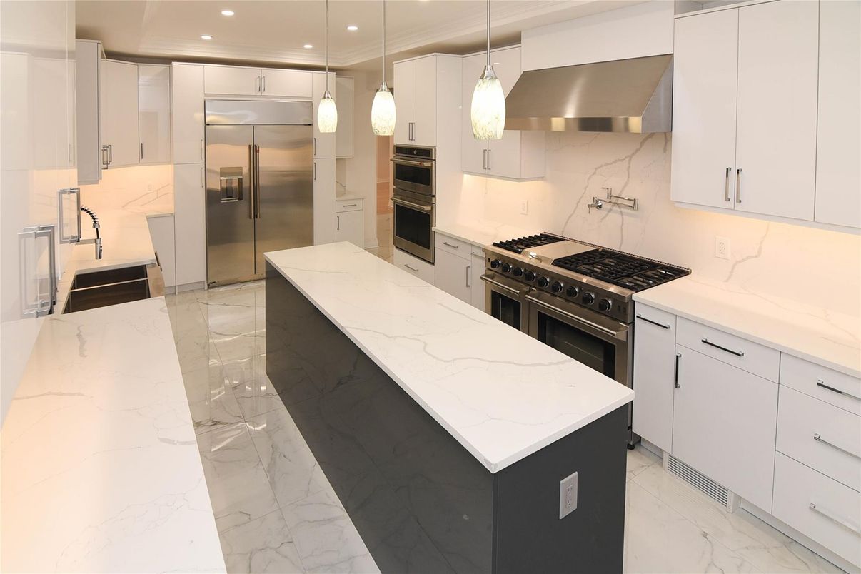 Interior, Kitchen, Marble, Marble Walls, Pendant Lights, Recessed Lighting, Stainless Steel Appliances