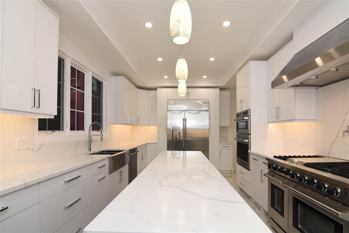 Interior, Kitchen, Marble Walls, Pendant Lights, Recessed Lighting, Stainless Steel Appliances