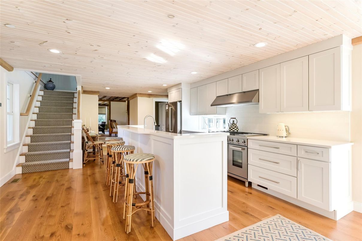 Dining room, Interior, Kitchen, Recessed Lighting, Stainless Steel Appliances, Wood Texture Flooring