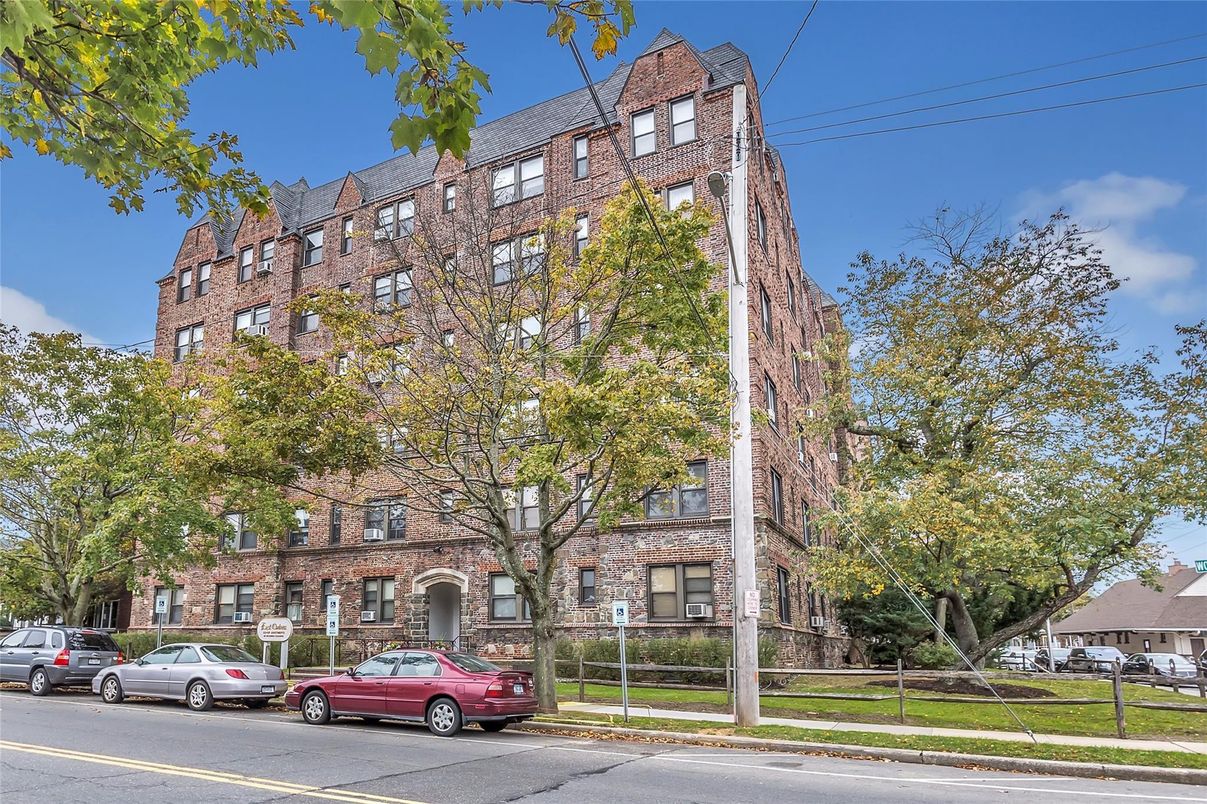 Exterior, Facade, Brick Facade, Condo Building