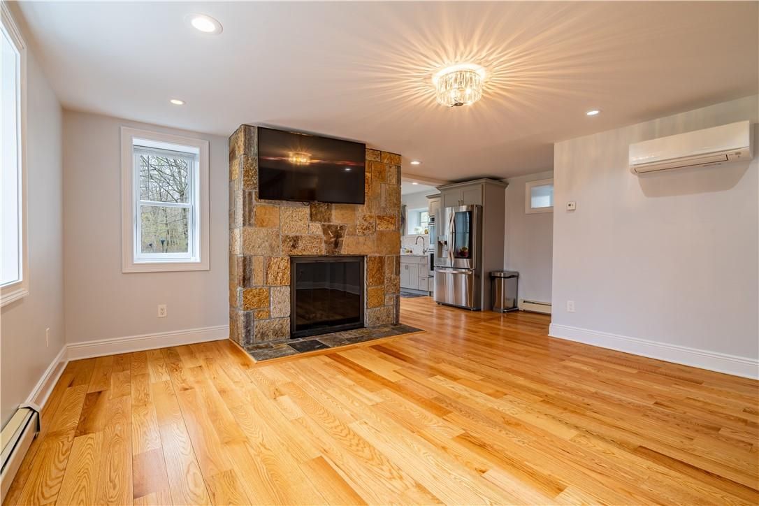 Empty room, Fireplace, Interior, Recessed Lighting, Wood Texture Flooring