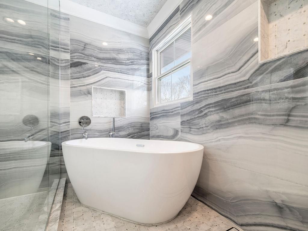 Bathroom, Free Standing Baths, Glass Shower, Interior, Marble Walls, Recessed Lighting