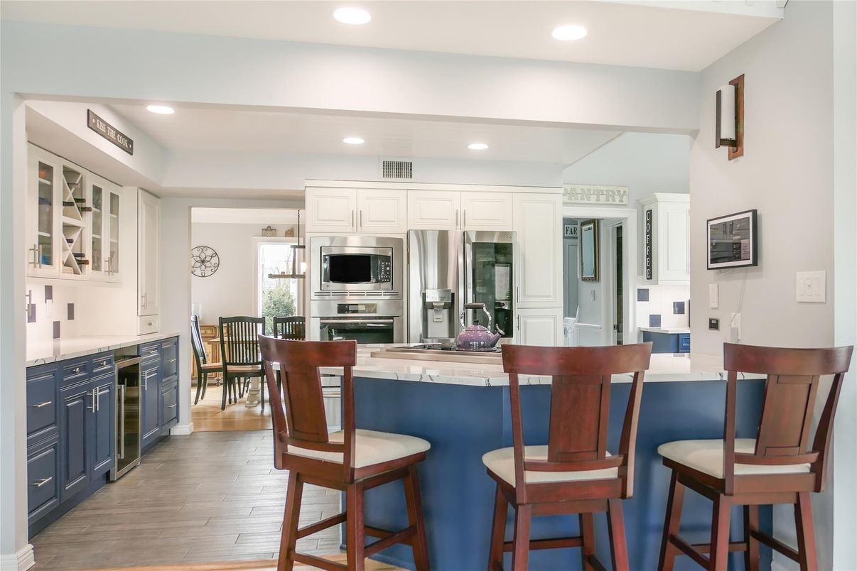 Dining room, Interior, Kitchen, Recessed Lighting, Stainless Steel Appliances, Wood Texture Flooring