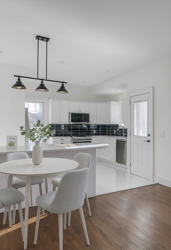 Dining room, Interior, Kitchen, Pendant Lights, Stainless Steel Appliances, Wood Texture Flooring