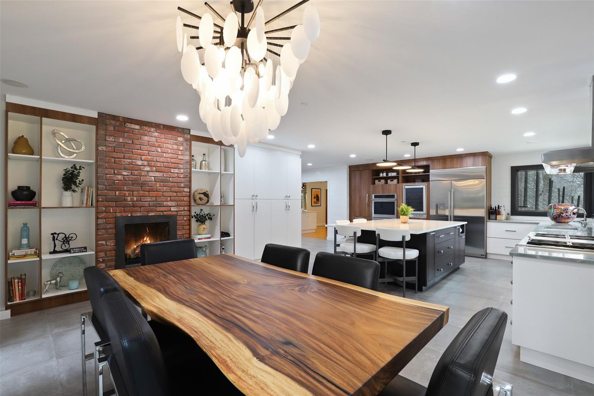 Dining room, Fireplace, Interior, Kitchen, Pendant Lights, Recessed Lighting, Stainless Steel Appliances, Stone Walls