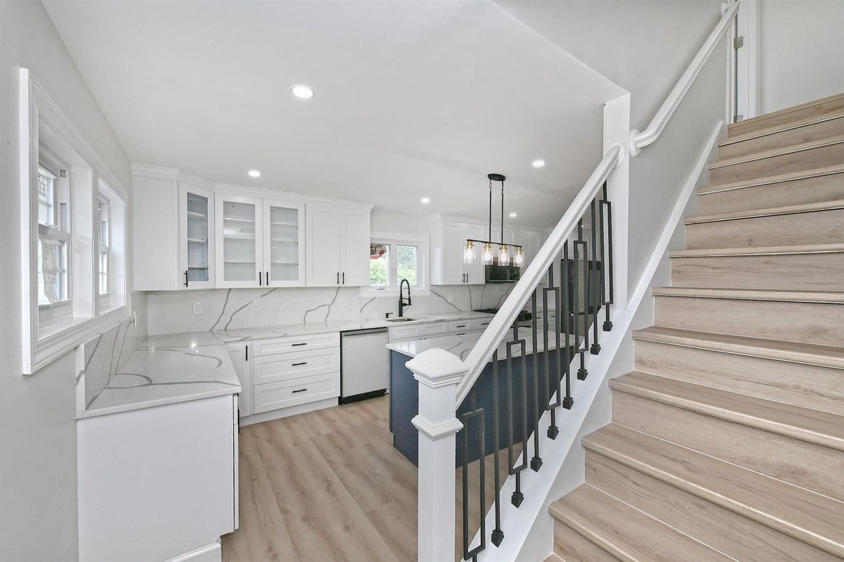 Interior, Kitchen, Marble Walls, Pendant Lights, Recessed Lighting, Wood Texture Flooring