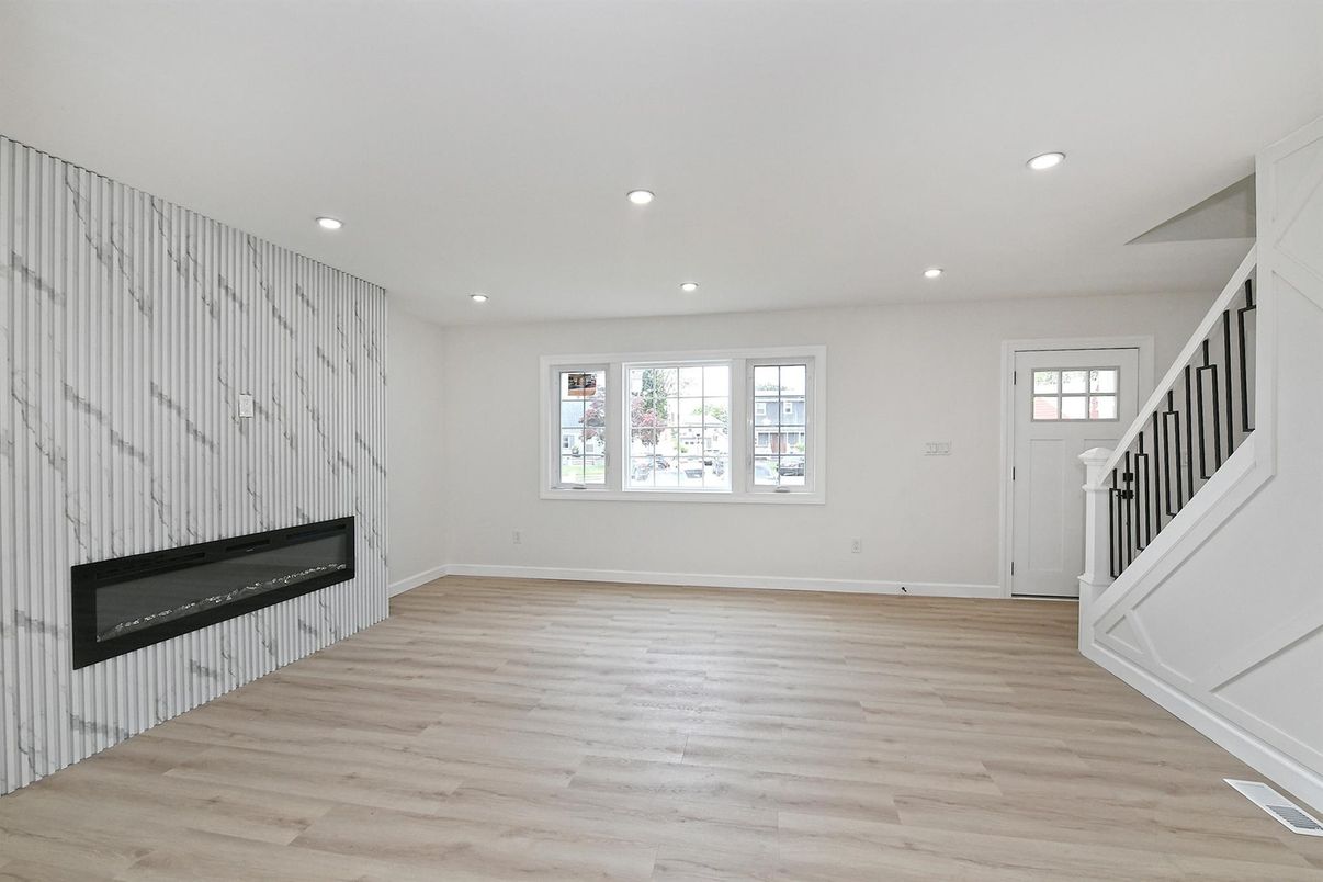 Empty room, Fireplace, Interior, Recessed Lighting, Wood Texture Flooring