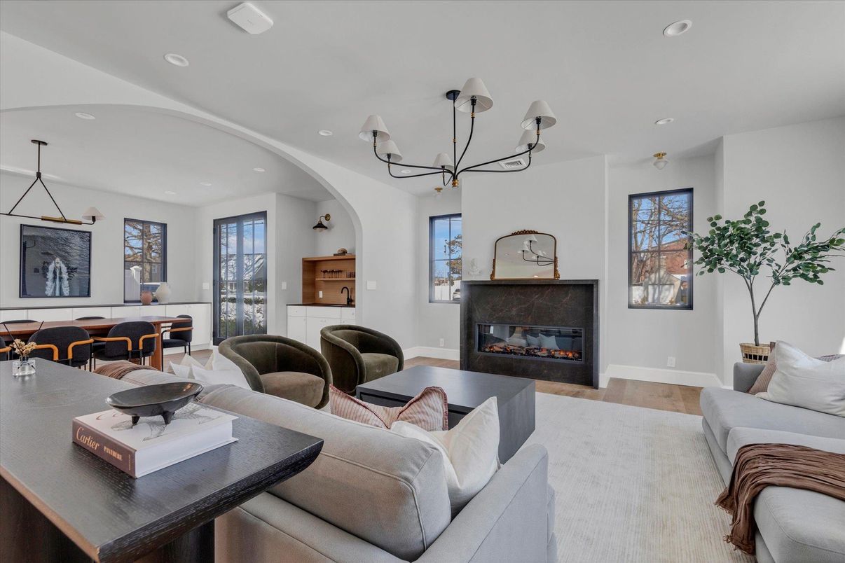 Chandelier, Dining room, Fireplace, Interior, Living room, Recessed Lighting, Wood Texture Flooring