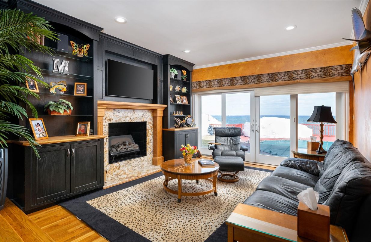 Fireplace, Interior, Living room, Recessed Lighting, Water, Wood Texture Flooring