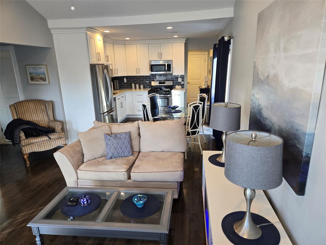 Dining room, Interior, Kitchen, Living room, Recessed Lighting, Stainless Steel Appliances, Wood Texture Flooring