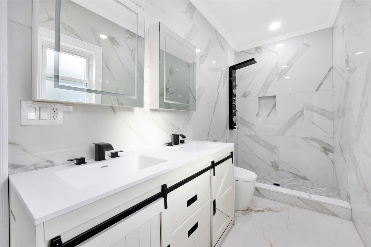 Bathroom, Dual Sink Vanities, Interior, Marble, Marble Walls, Recessed Lighting