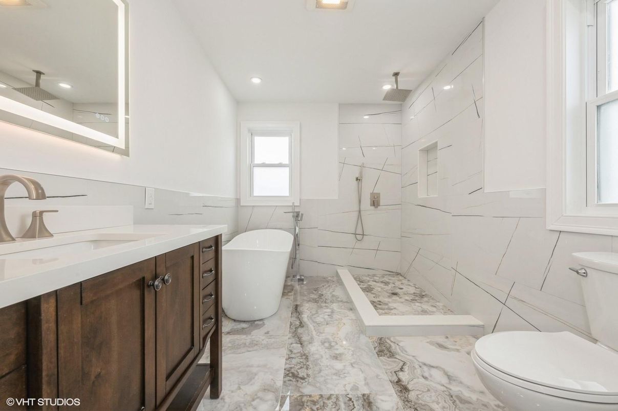 Bathroom, Dual Sink Vanities, Free Standing Baths, Glass Shower, Interior, Marble, Marble Walls, Recessed Lighting