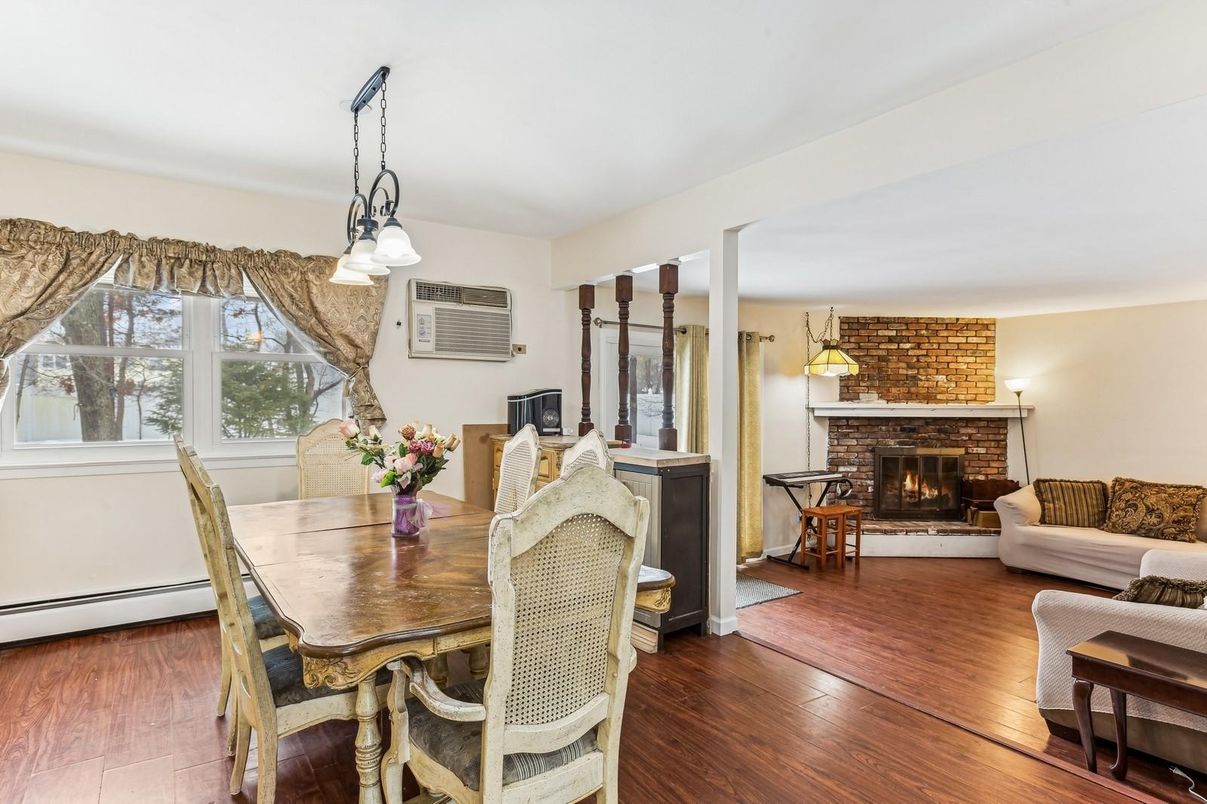Dining room, Fireplace, Interior, Living room, Pendant Lights, Stone Walls, Wood Texture Flooring