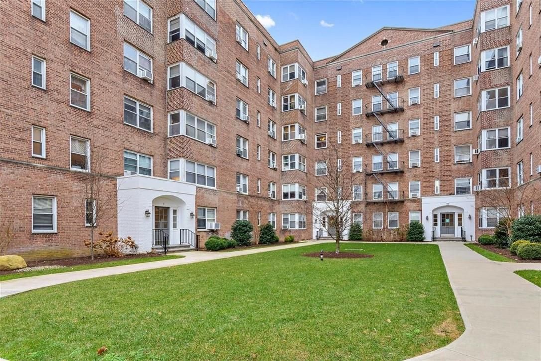 Backyard, Exterior, Facade, Brick Facade, Condo Building