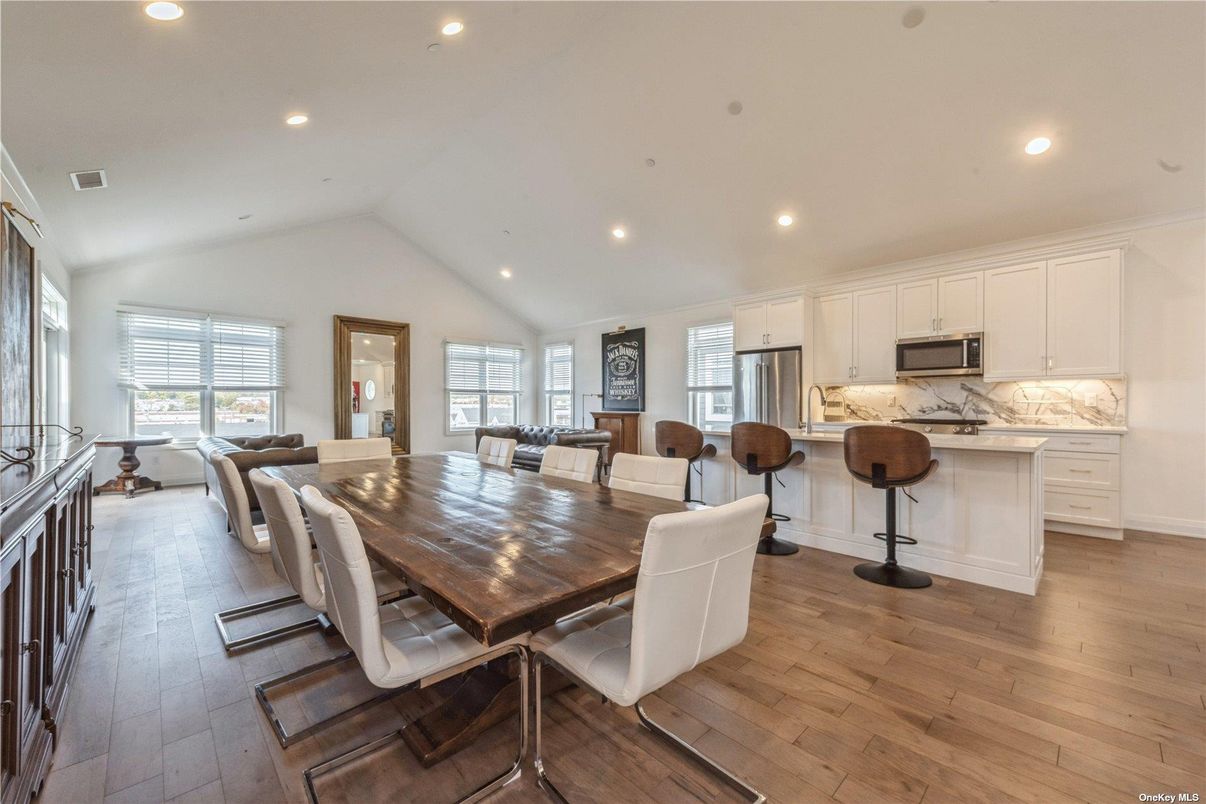 Dining room, Interior, Kitchen, Living room, Recessed Lighting, Stainless Steel Appliances, Wood Texture Flooring