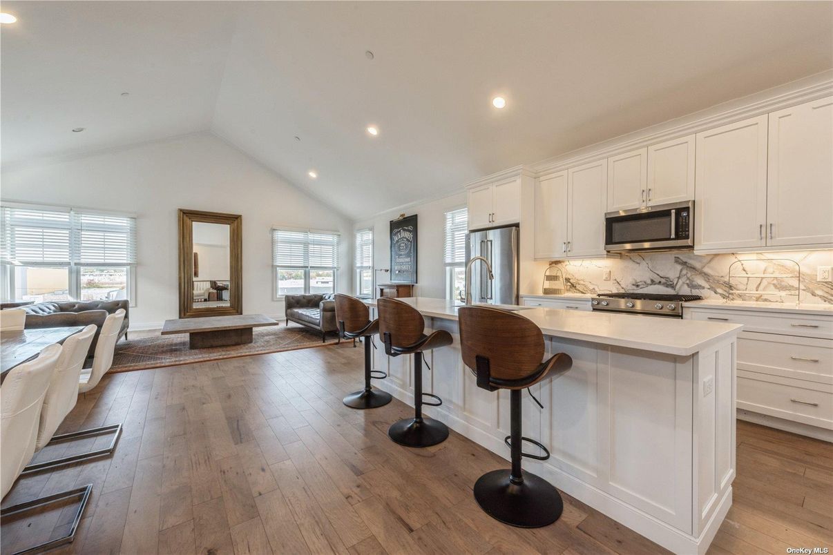 Interior, Kitchen, Living room, Marble Walls, Recessed Lighting, Stainless Steel Appliances, Wood Texture Flooring