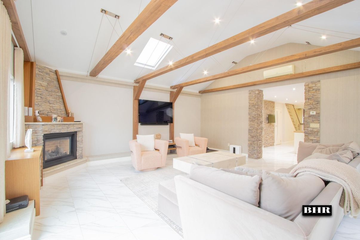 Fireplace, Interior, Living room, Marble, Recessed Lighting, Stone Walls, Wooden Beams