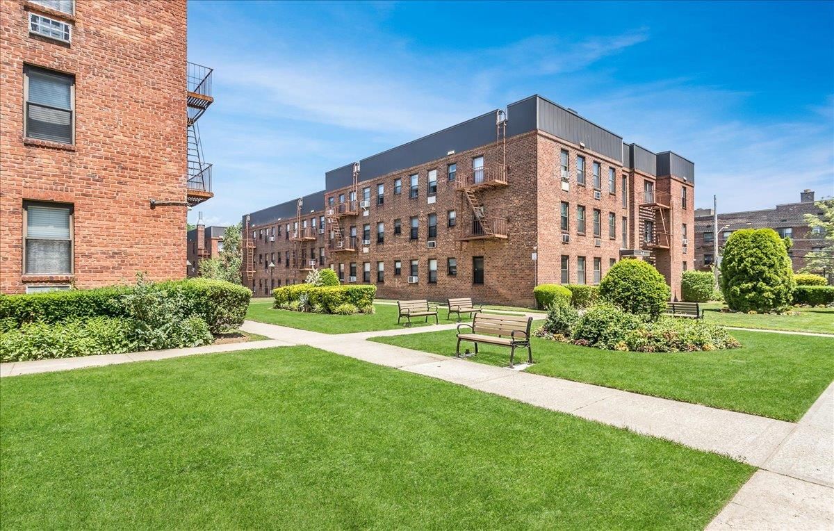 Backyard, Exterior, Facade, Brick Facade, Condo Building