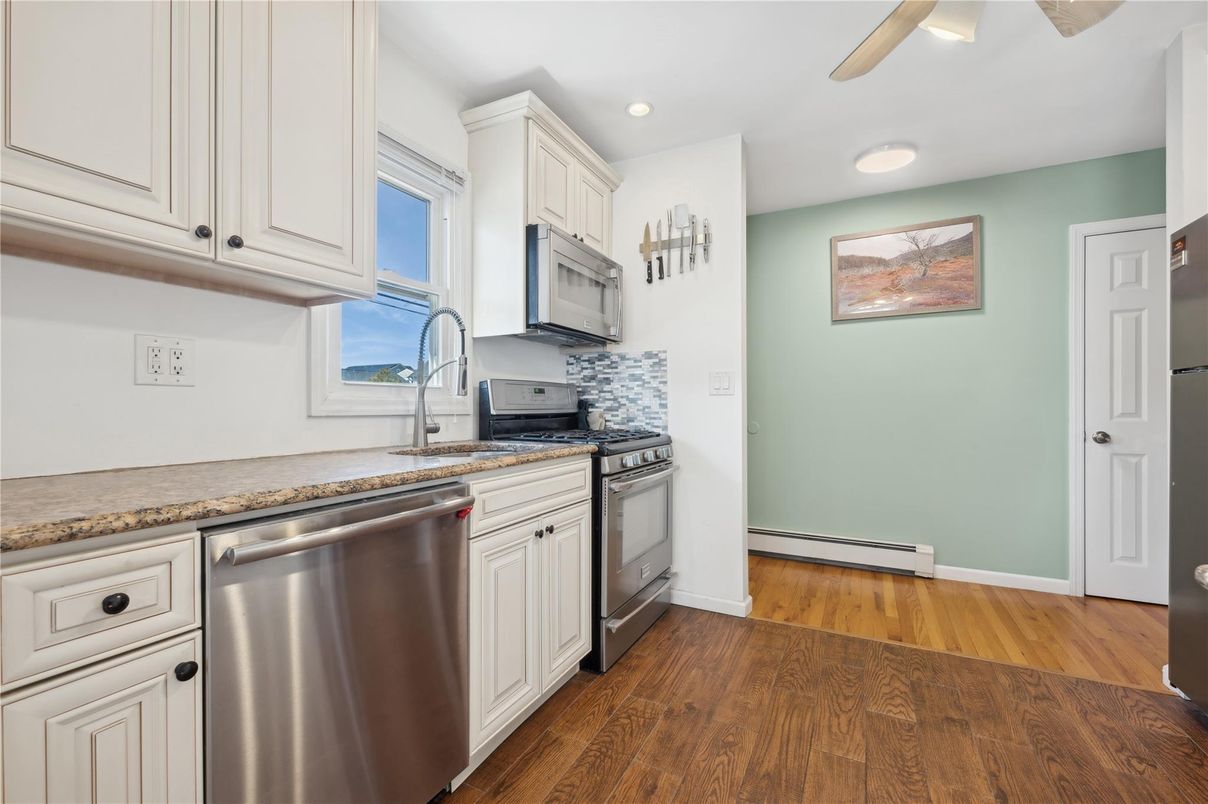 Interior, Kitchen, Recessed Lighting, Stainless Steel Appliances, Wood Texture Flooring