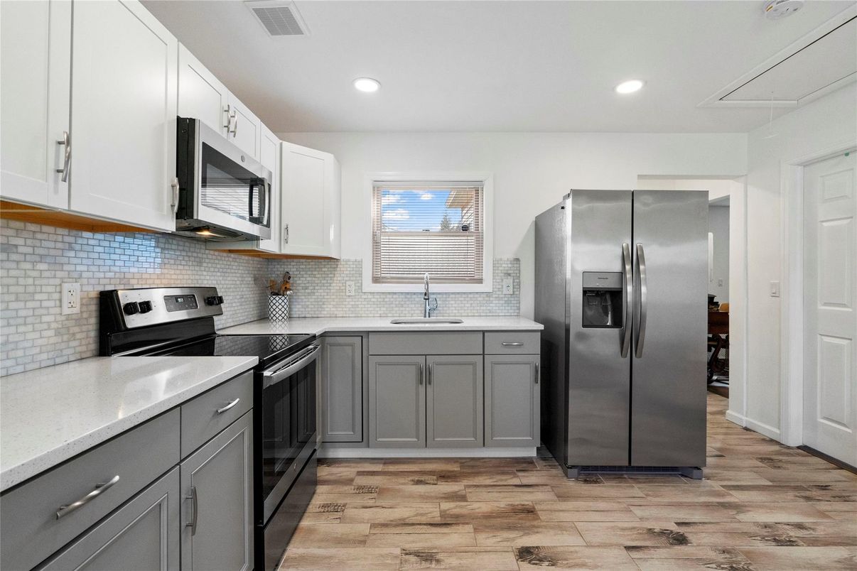Interior, Kitchen, Recessed Lighting, Stainless Steel Appliances, Wood Texture Flooring