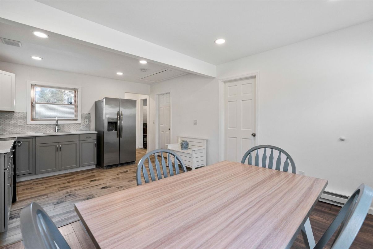 Dining room, Interior, Kitchen, Recessed Lighting, Stainless Steel Appliances, Wood Texture Flooring