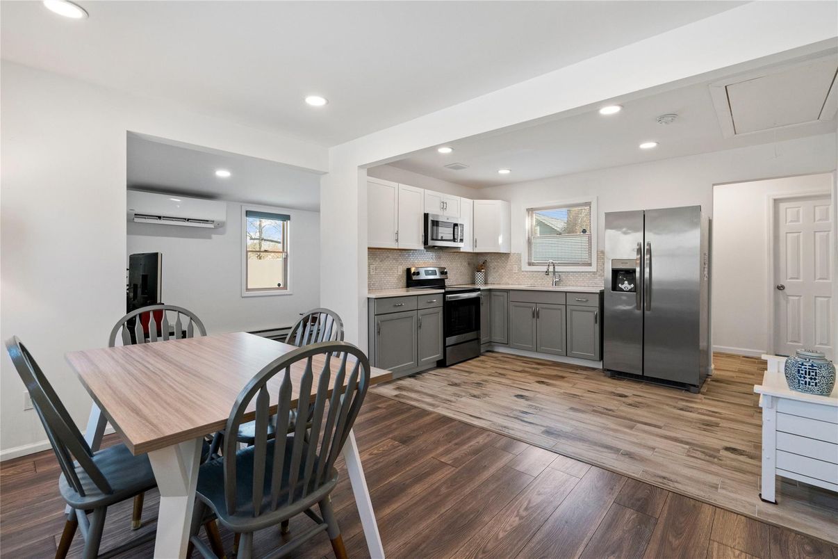 Dining room, Interior, Kitchen, Recessed Lighting, Stainless Steel Appliances, Wood Texture Flooring