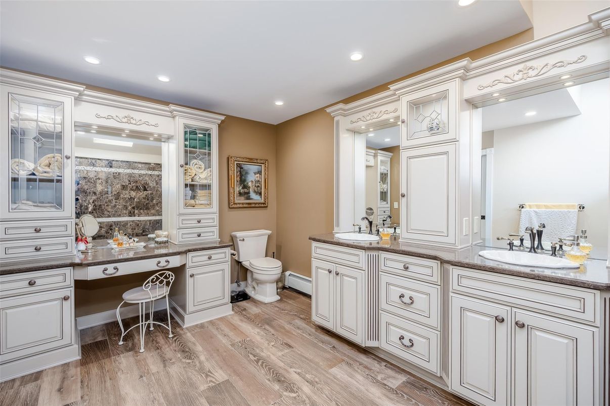 Bathroom, Dual Sink Vanities, Interior, Recessed Lighting, Wood Texture Flooring