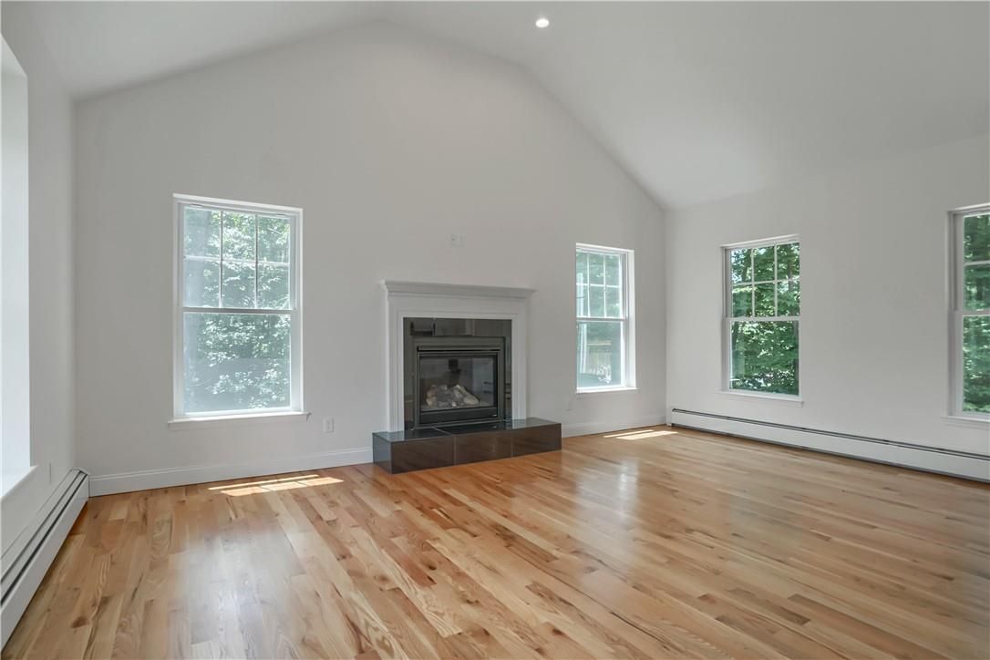 Empty room, Fireplace, Interior, Recessed Lighting, Wood Texture Flooring