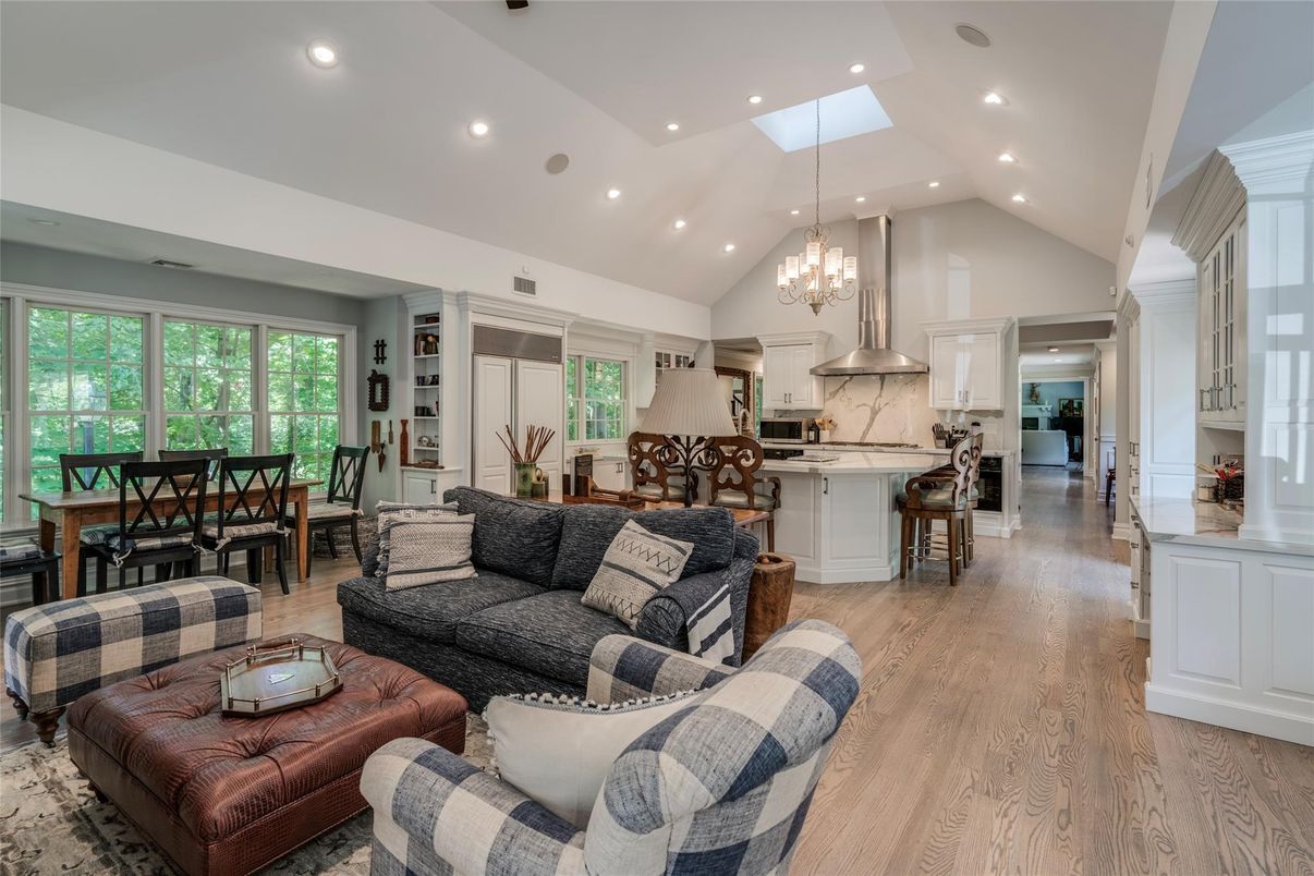 Chandelier, Dining room, Interior, Kitchen, Living room, Recessed Lighting, Stainless Steel Appliances, Wood Texture Flooring