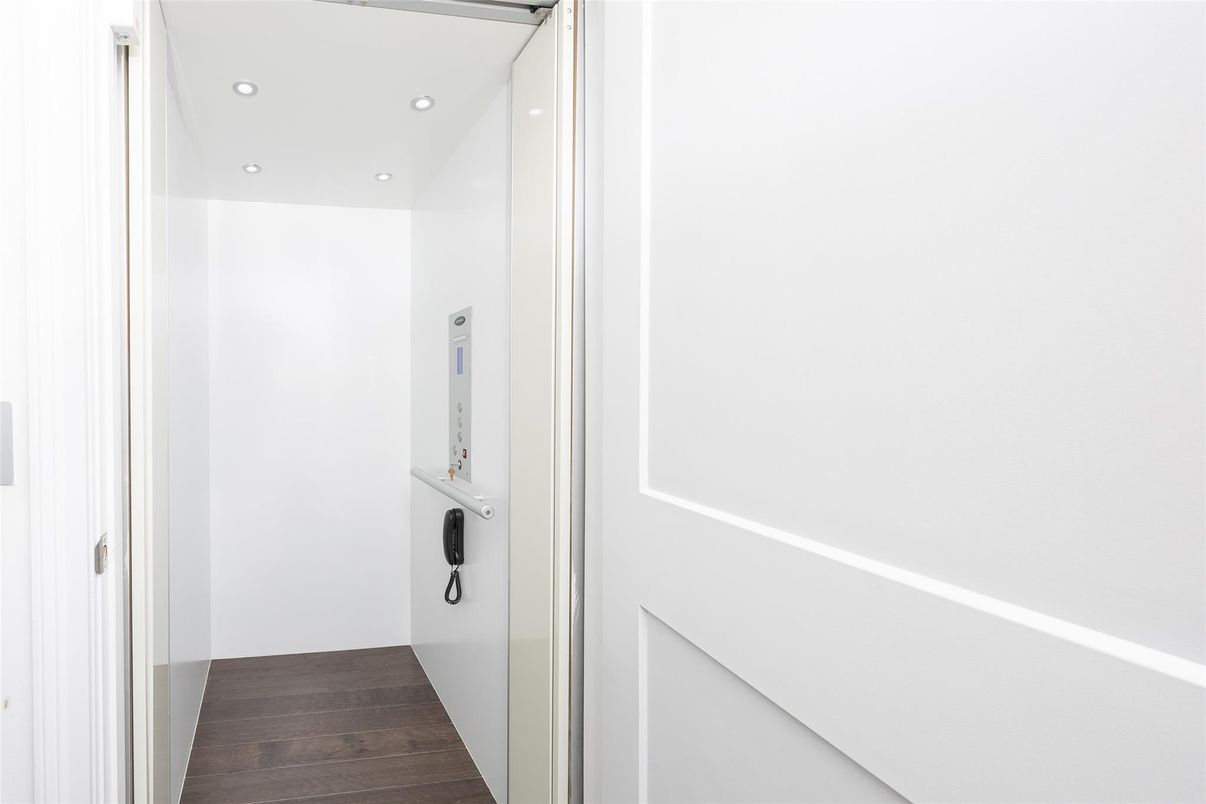 Elevator, Interior, Recessed Lighting, Wood Texture Flooring