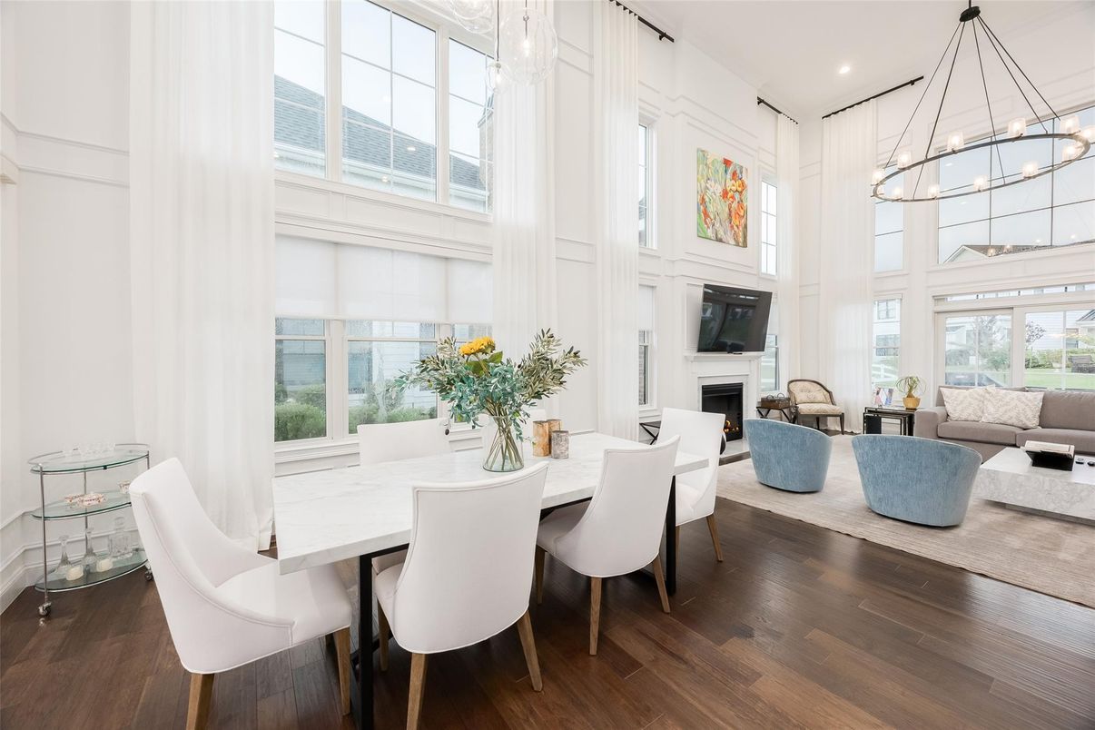 Dining room, Fireplace, Interior, Living room, Pendant Lights, Recessed Lighting, Wood Texture Flooring