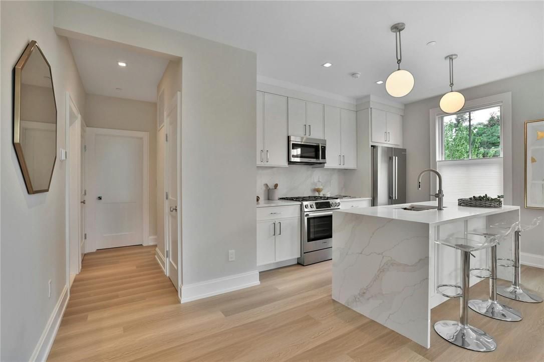 Interior, Kitchen, Pendant Lights, Recessed Lighting, Stainless Steel Appliances, Wood Texture Flooring