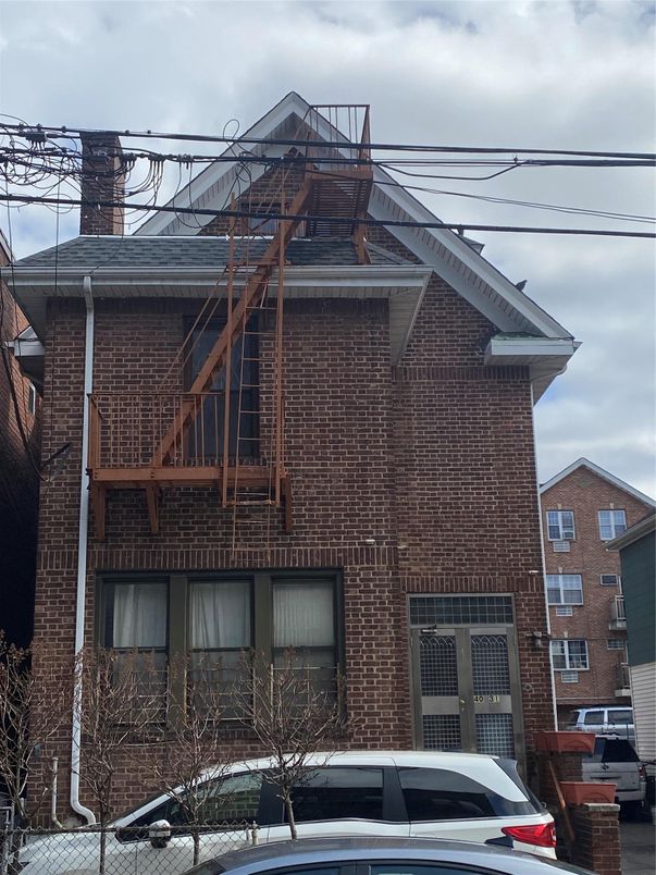 Exterior, Facade, Brick Facade, Condo Building