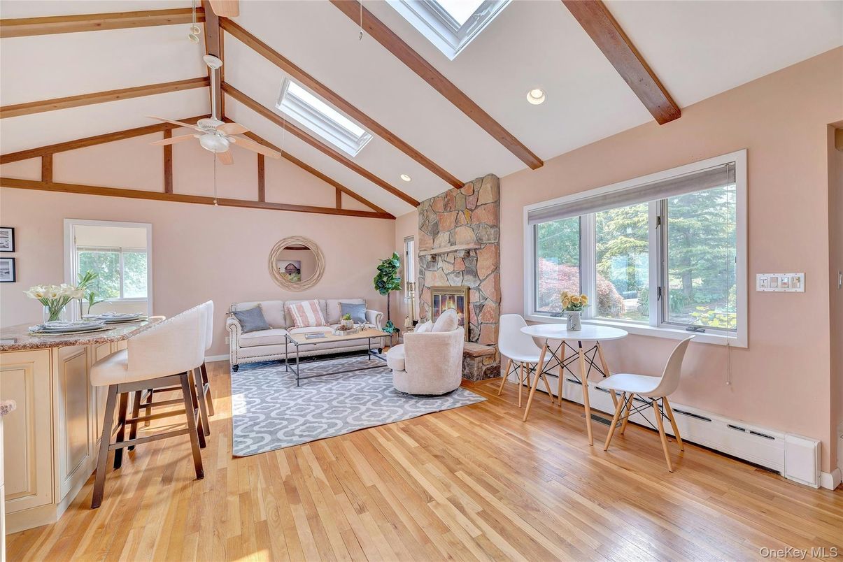 Fireplace, Interior, Living room, Recessed Lighting, Stone Walls, Wooden Beams, Wood Texture Flooring