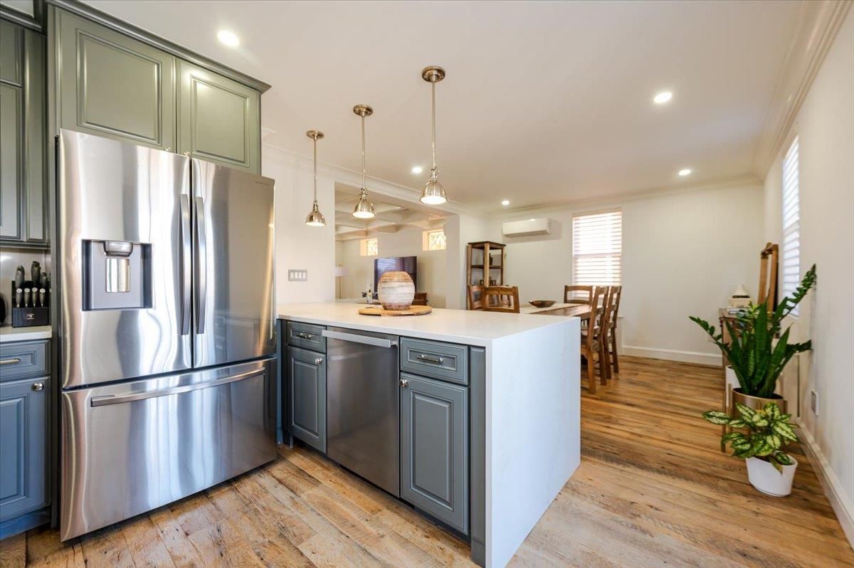 Dining room, Interior, Kitchen, Pendant Lights, Recessed Lighting, Stainless Steel Appliances, Wood Texture Flooring