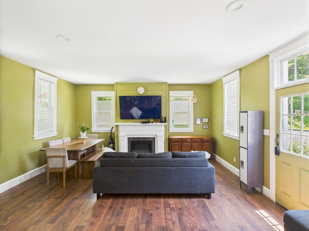 Dining room, Fireplace, Interior, Living room, Recessed Lighting, Wood Texture Flooring