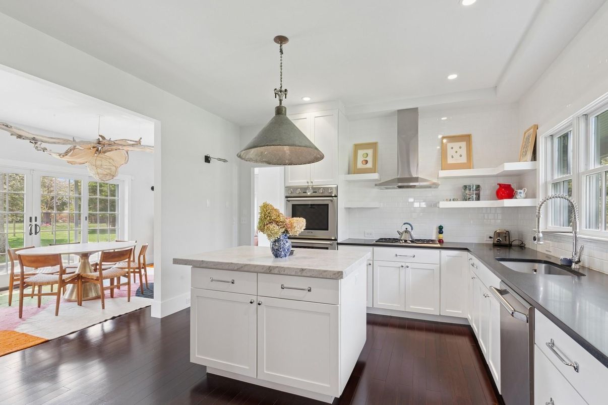 Dining room, Interior, Kitchen, Pendant Lights, Recessed Lighting, Stainless Steel Appliances, Wood Texture Flooring