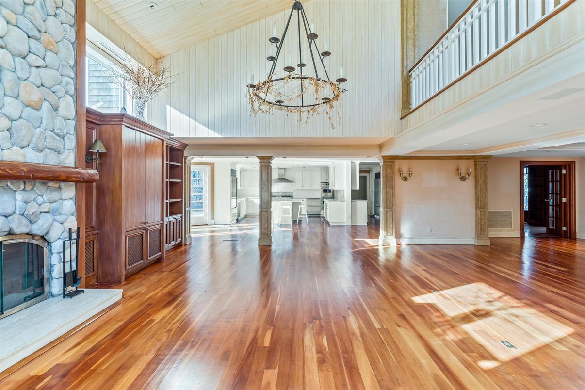 Chandelier, Empty room, Fireplace, Interior, Stone Walls, Wood Texture Flooring