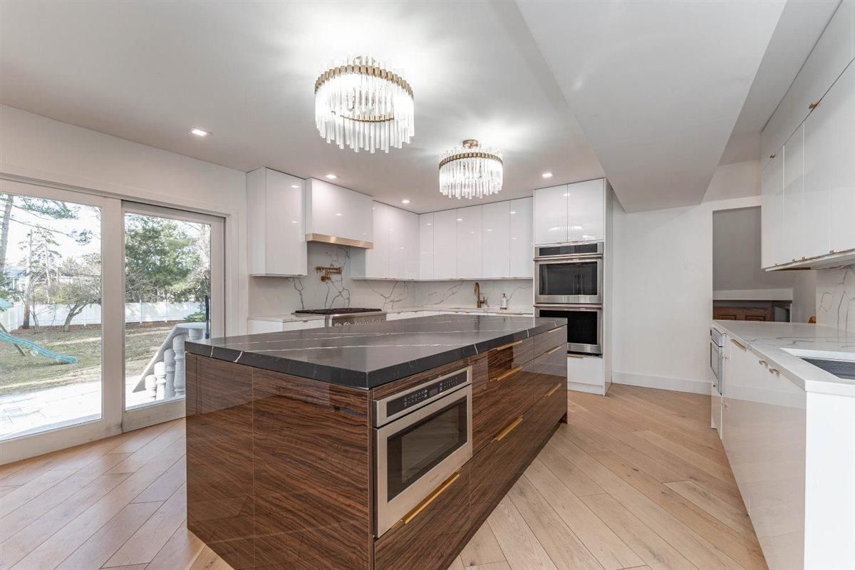 Chandelier, Interior, Kitchen, Recessed Lighting, Stainless Steel Appliances, Wood Texture Flooring