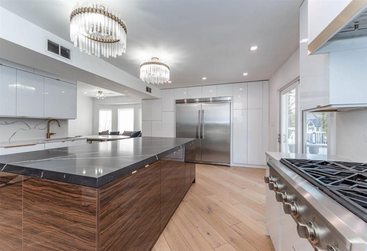Chandelier, Interior, Kitchen, Recessed Lighting, Stainless Steel Appliances, Wood Texture Flooring