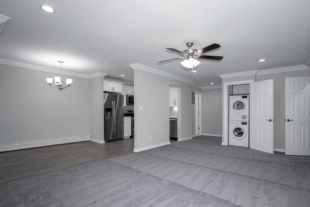 Chandelier, Empty room, Interior, Kitchen, Recessed Lighting, Stainless Steel Appliances, Wood Texture Flooring