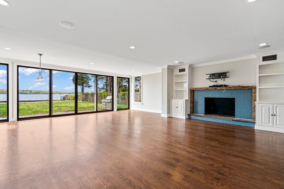 Empty room, Fireplace, Interior, Pendant Lights, Recessed Lighting, Wood Texture Flooring