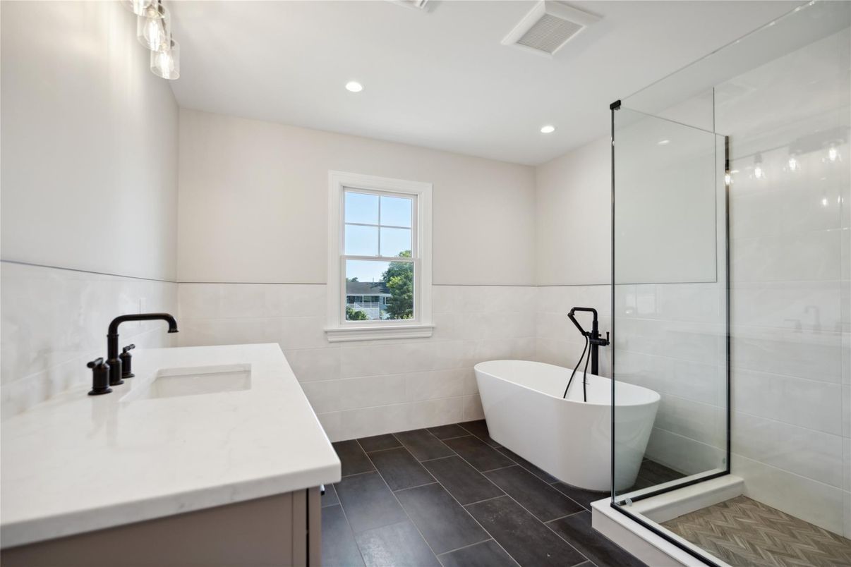 Bathroom, Dual Sink Vanities, Free Standing Baths, Glass Shower, Interior, Recessed Lighting, Wood Texture Flooring