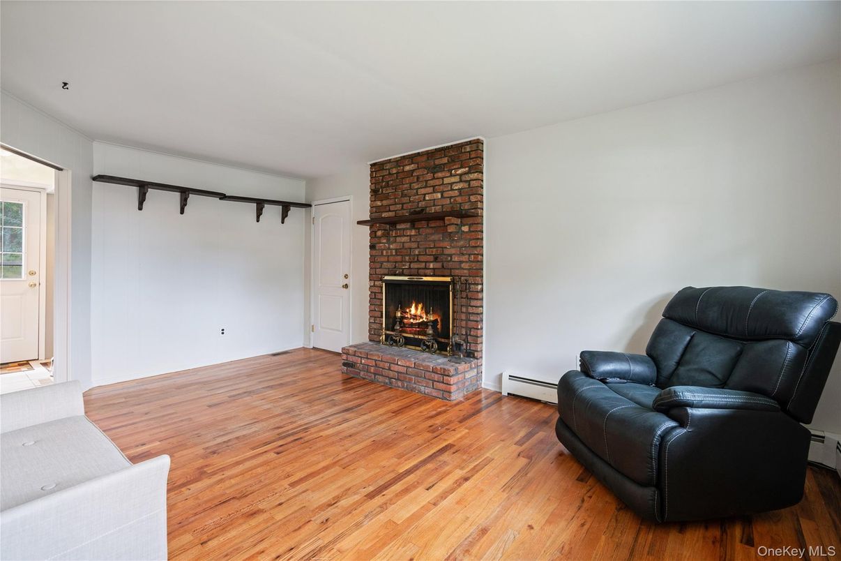 Empty room, Fireplace, Interior, Stone Walls, Wood Texture Flooring