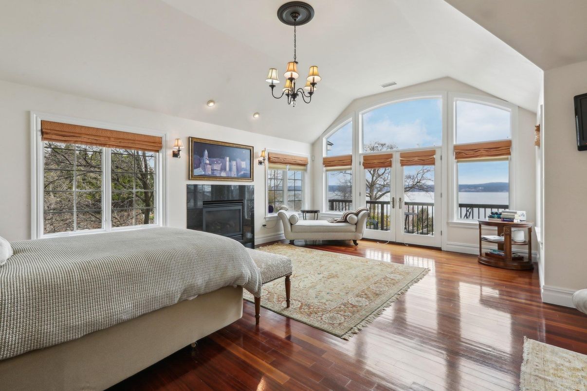 Bedroom, Chandelier, Fireplace, Interior, Wood Texture Flooring
