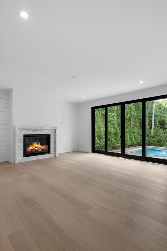 Empty room, Fireplace, Interior, Recessed Lighting, Wood Texture Flooring
