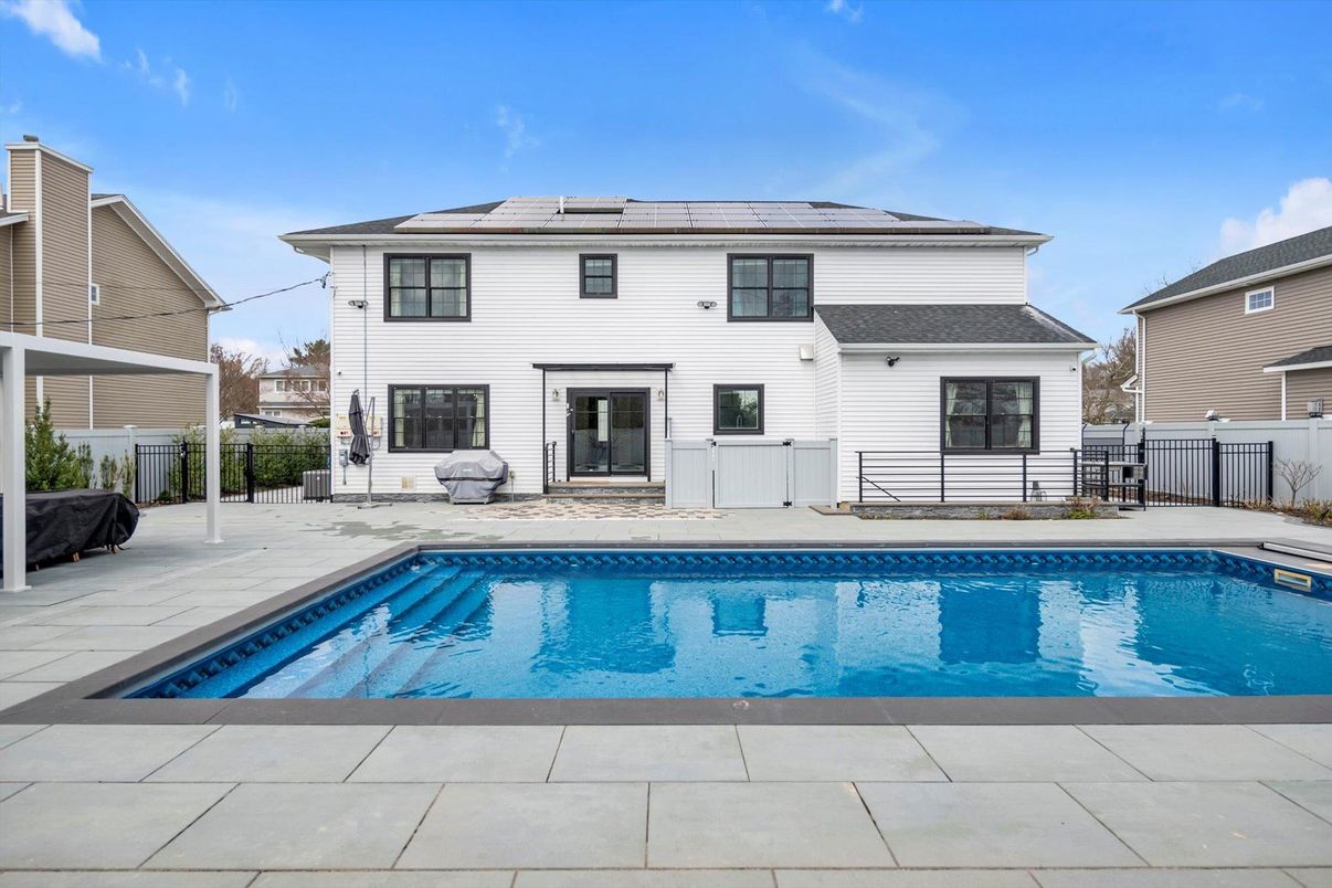 Exterior, Pool, Solar Panels